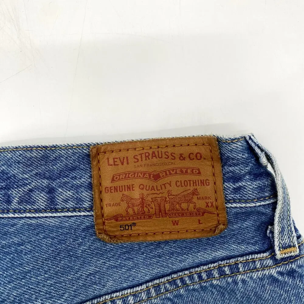 Levi's 501 denim raw hem distressed long‎ shorts
